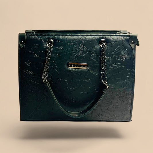 Graciza black faux leather Flora shoulder bag with floral embossed texture and decorative chain handle detailing.