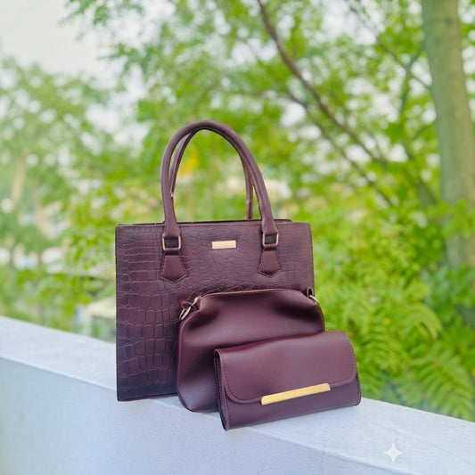 Graciza Lyra burgundy faux leather handbag set with crocodile texture, crossbody bag, and wallet with gold hardware.