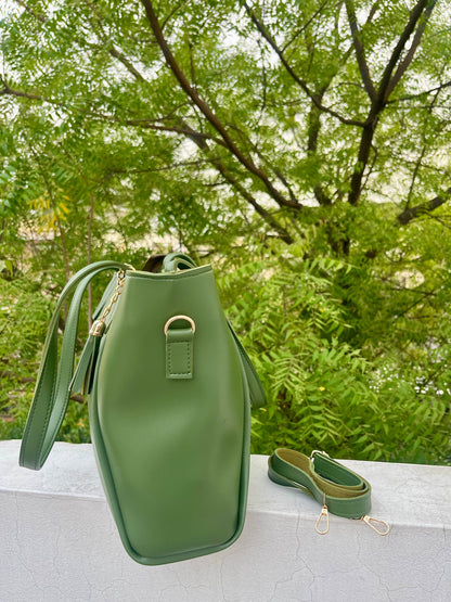 Graciza Aura green faux leather tote bag with gold-tone hardware, decorative tassel, and removable shoulder strap.