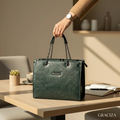 Graciza dark green faux leather Flora shoulder bag with floral embossing, chain handles, and top-zip closure.
