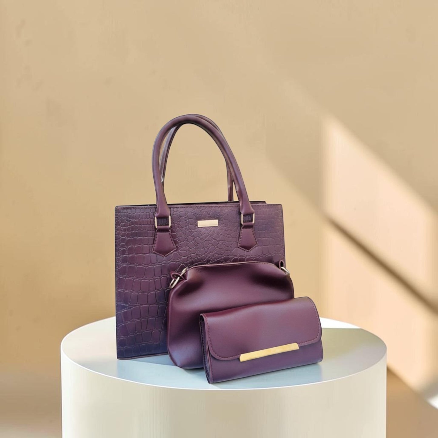 Graciza Lyra burgundy faux leather handbag set with crocodile texture, matching crossbody bag, and wallet.