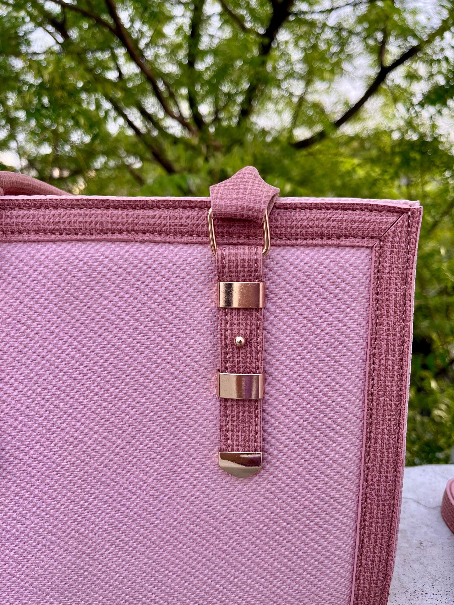 Graciza Sia square faux leather handbag in two-tone pink with textured panels and gold hardware details.